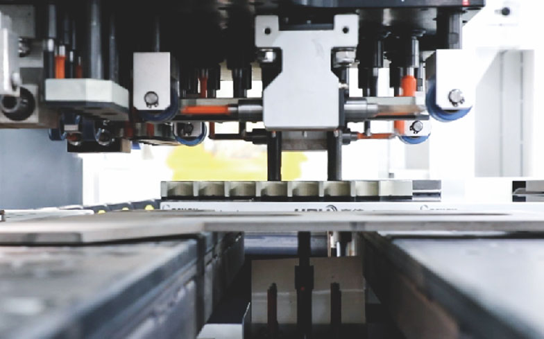 Double-station six-sided drilling multi-machine connection